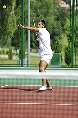 Image showing young man play tennis outdoor