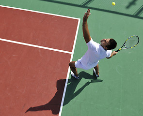 Image showing young man play tennis outdoor