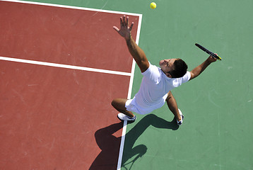 Image showing young man play tennis outdoor