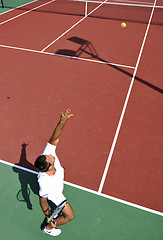 Image showing young man play tennis outdoor