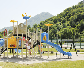 Image showing family portrait at park playground