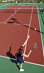 Image showing young woman play tennis game outdoor