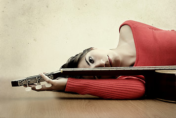 Image showing Girl with a guitar