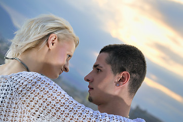 Image showing romantic urban couple dancing on top of  bulding