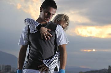 Image showing romantic urban couple dancing outdoor