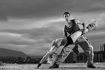 Image showing romantic urban couple dancing outdoor