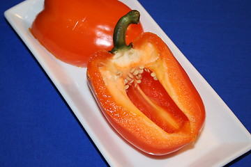 Image showing Orange paprika, blue background