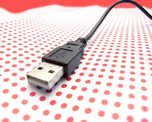 Image showing usb cable on dotted background
