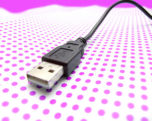 Image showing usb cable on dotted background