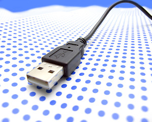 Image showing usb cable on dotted background