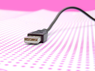 Image showing usb cable on dotted background