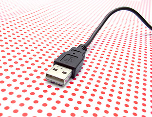 Image showing usb cable on dotted background