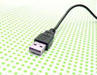 Image showing usb cable on dotted background