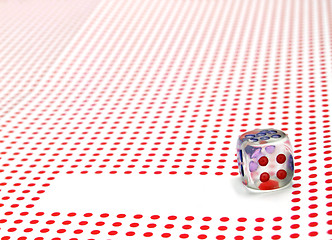 Image showing empty space for write and gambling dice on red dotted background