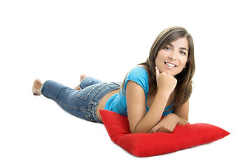 Image showing Beautiful woman with a soft cushion