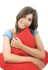Image showing Beautiful woman with a soft cushion