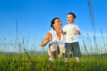 Image showing woman child bubble