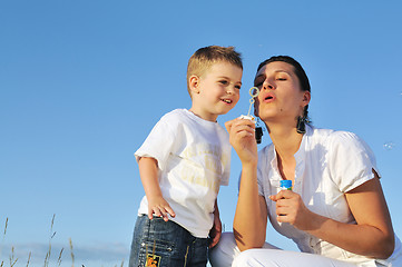 Image showing woman child bubble