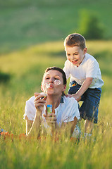 Image showing woman child bubble