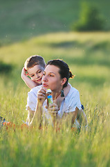 Image showing woman child bubble