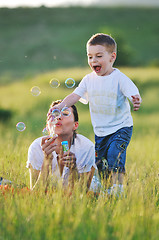 Image showing woman child bubble