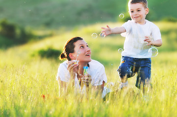 Image showing woman child bubble