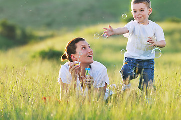 Image showing woman child bubble