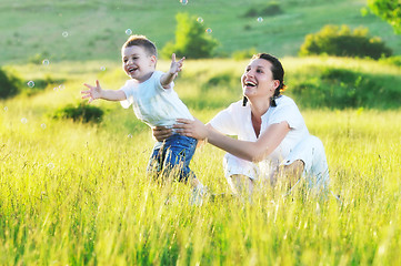 Image showing woman child bubble