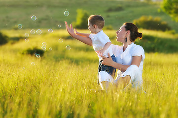 Image showing woman child bubble