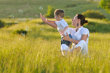 Image showing woman child bubble