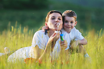 Image showing woman child bubble