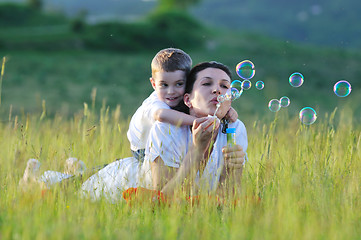 Image showing woman child bubble