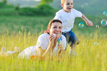 Image showing woman child bubble