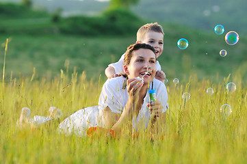 Image showing woman child bubble