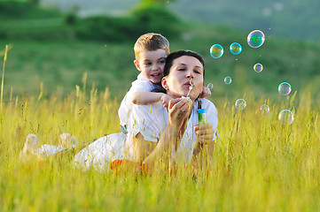 Image showing woman child bubble