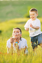 Image showing woman child bubble