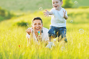 Image showing woman child bubble