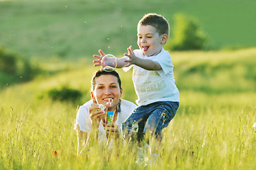 Image showing woman child bubble