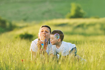 Image showing woman child bubble