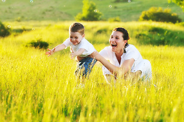 Image showing woman child bubble