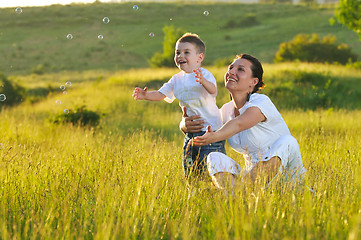 Image showing woman child bubble