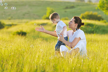 Image showing woman child bubble