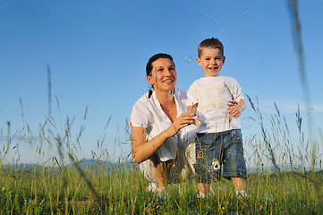 Image showing woman child bubble