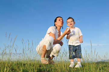 Image showing woman child bubble