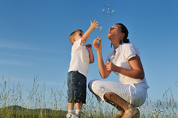 Image showing woman child bubble