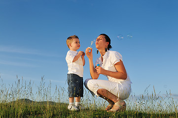 Image showing woman child bubble