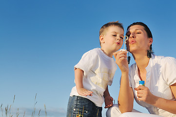 Image showing woman child bubble