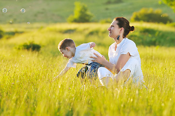 Image showing woman child bubble