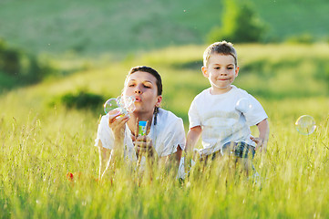 Image showing woman child bubble