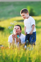 Image showing woman child bubble